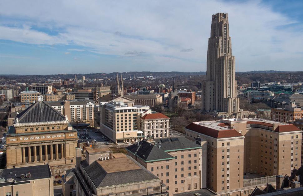 Cathedral of Learning surrounded by other buildings