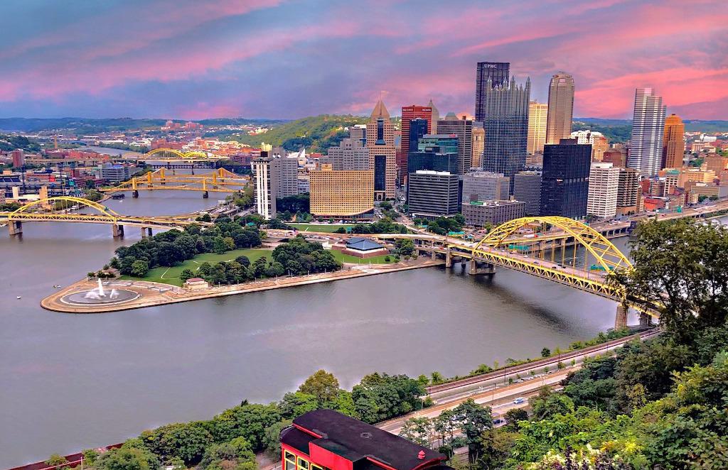 Pittsburgh skyline showing buildings, river, bridges and trees